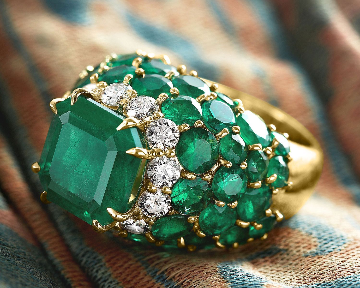 A group of rings are sitting on top of each other on a table.