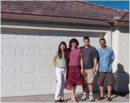 Family in front of garage door - Bristol, TN Family in front of garage door - Bristol, TN