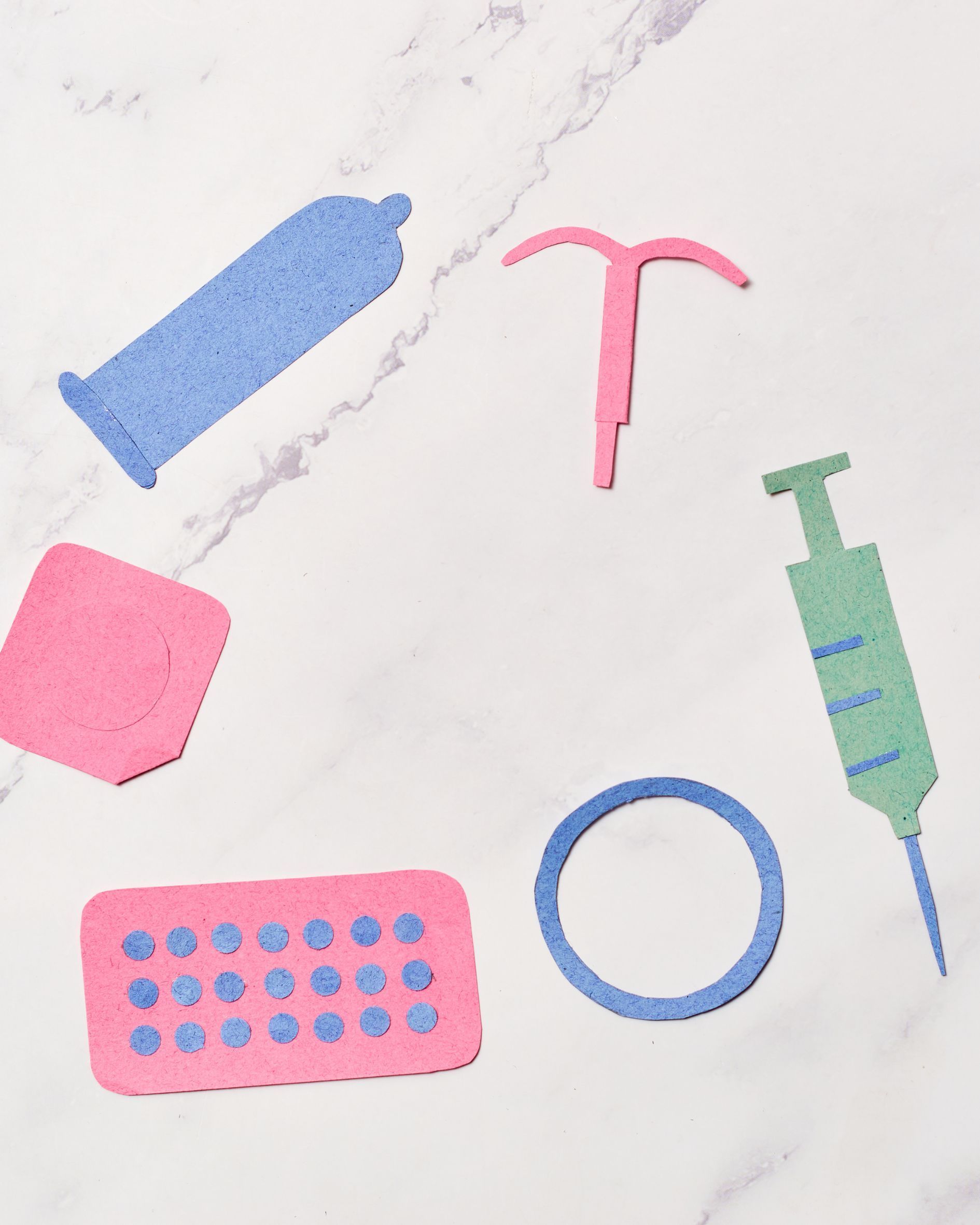 Various forms of contraception: condom, IUD, patch, birth control pills, ring, and shot.