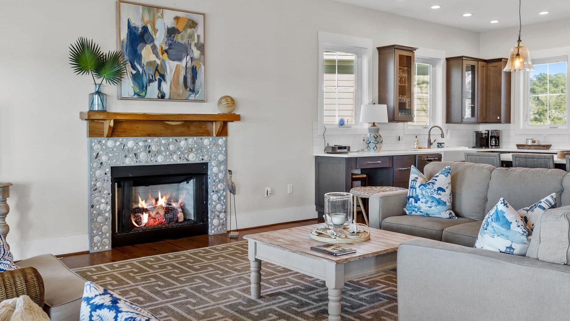 A living room with a fireplace and a couch.