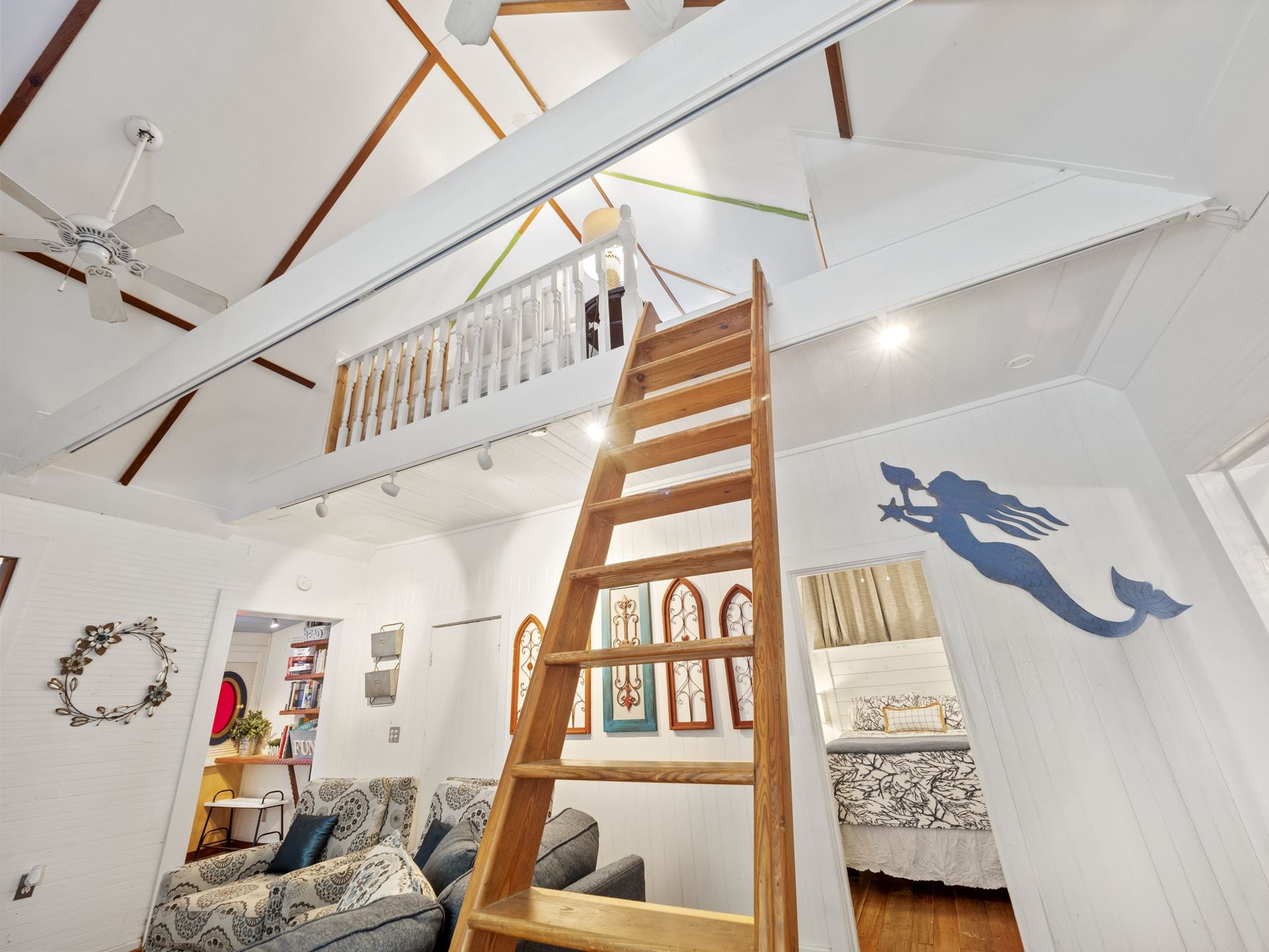 A wooden staircase leading to the second floor of a house