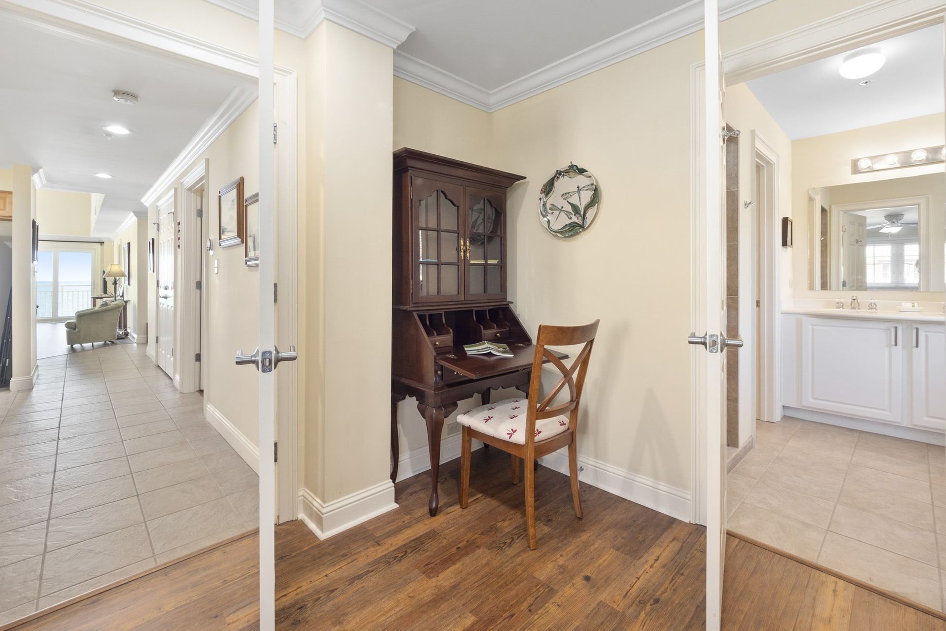 A collage of three pictures of a house with a desk and chair