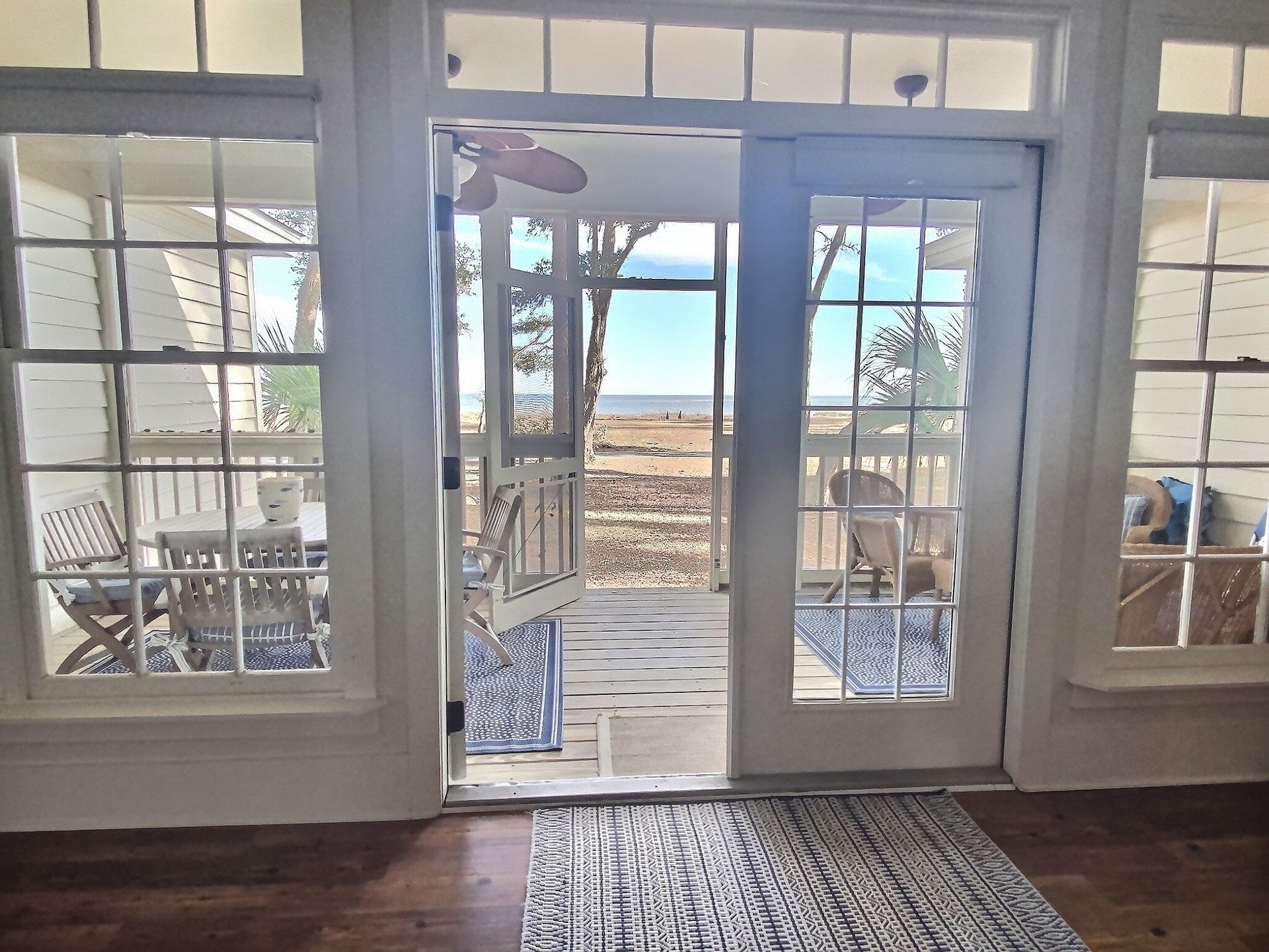 A room with sliding glass doors leading to a deck