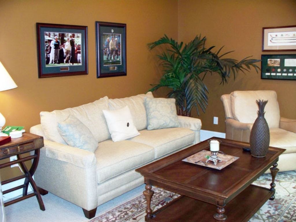 A living room with a couch and a coffee table
