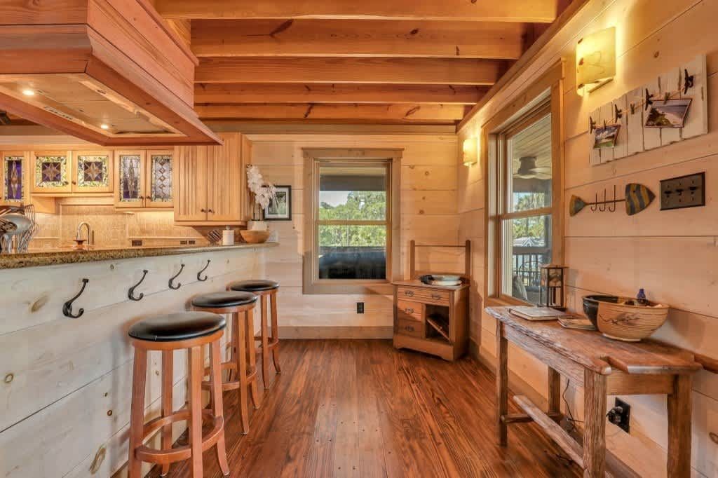 A laundry room with a washer and dryer and a fire extinguisher.