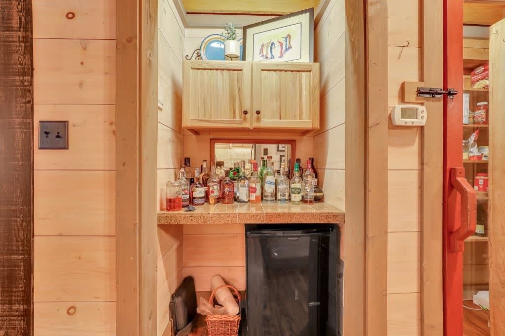 An aerial view of a large swimming pool surrounded by buildings.