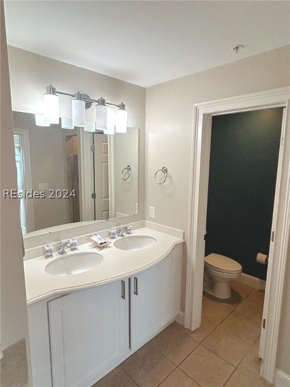 There is a shuffleboard table on the porch of a house.