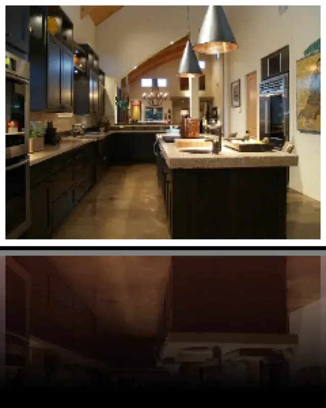 A kitchen with a large island and lots of cabinets