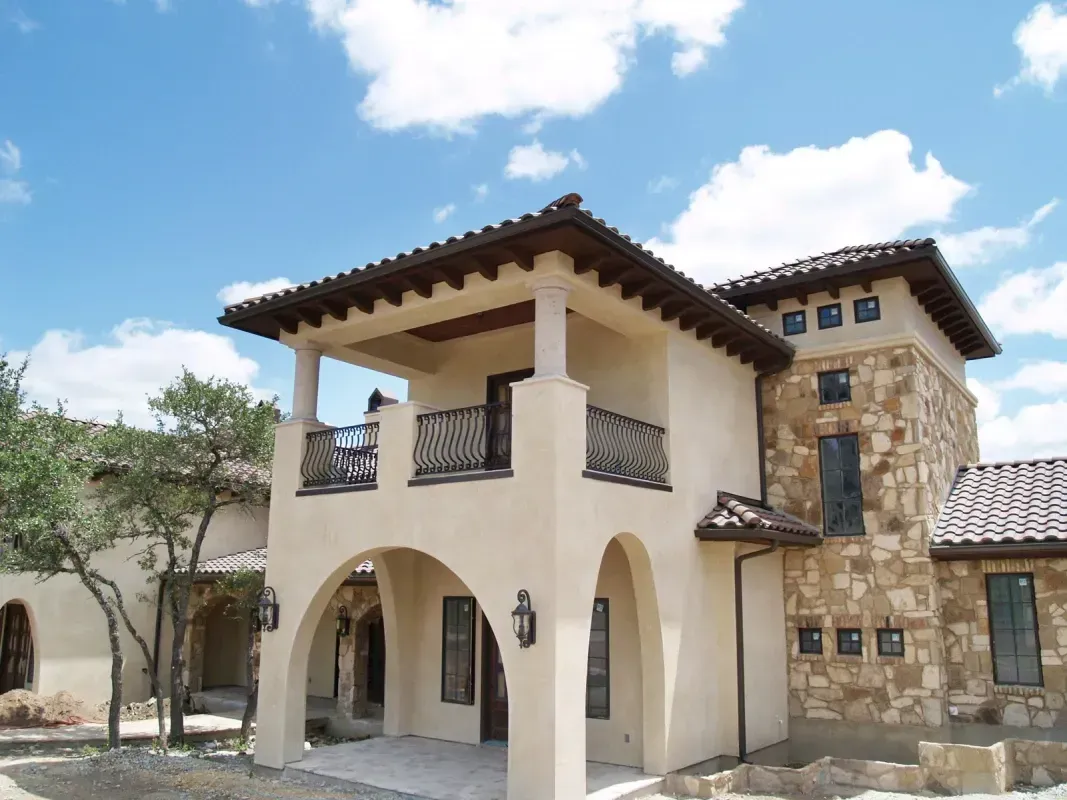 A large house with a balcony on the second floor