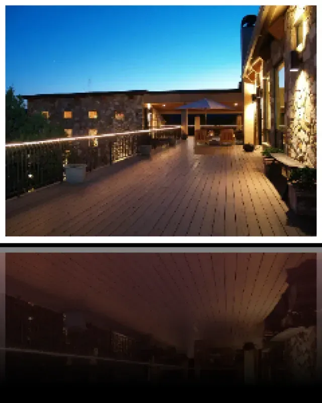 A picture of a deck with a building in the background