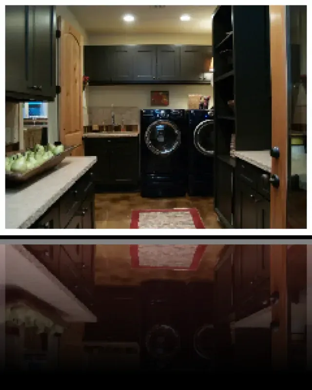 A laundry room with a washer and dryer in it