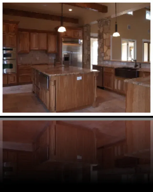 A kitchen with wooden cabinets and stainless steel appliances