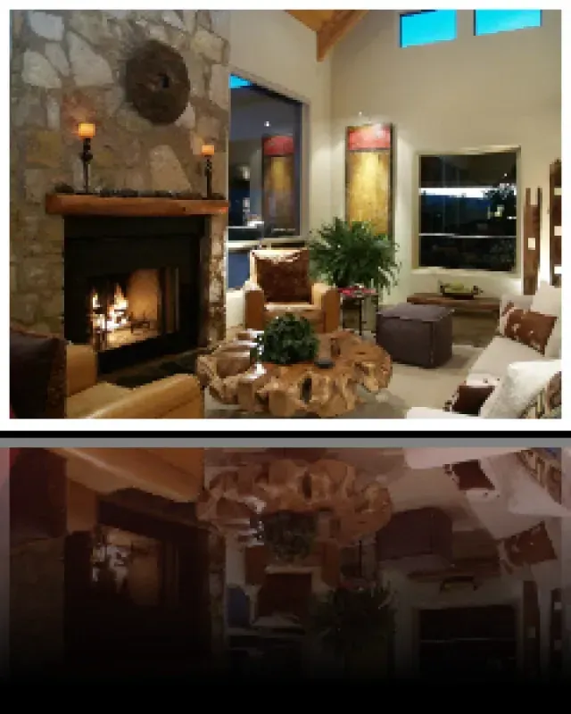 A living room with a fireplace and lots of furniture