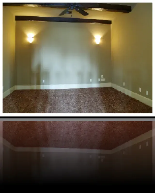 A picture of an empty room with a ceiling fan