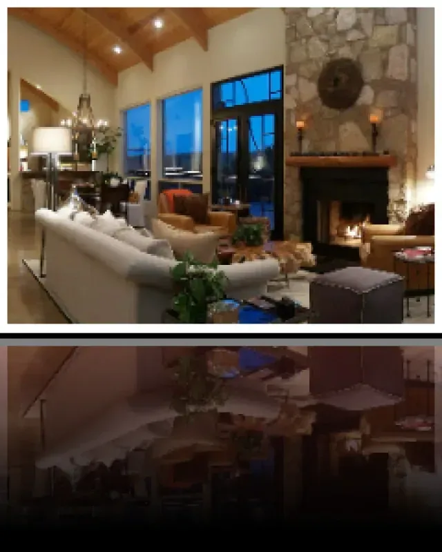 A living room with a couch and chairs and a fireplace