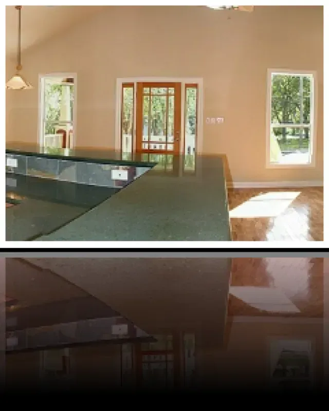 A picture of a kitchen with a green counter top