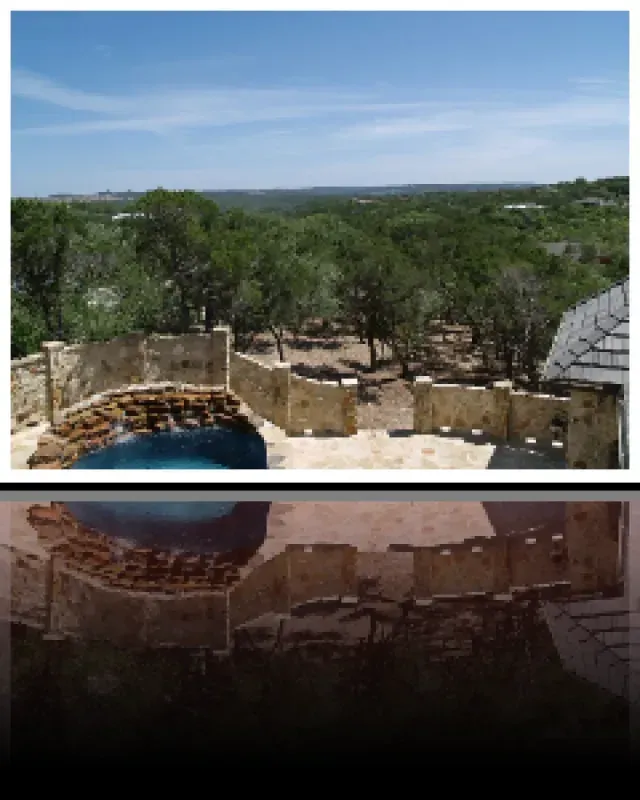 A picture of a swimming pool with trees in the background