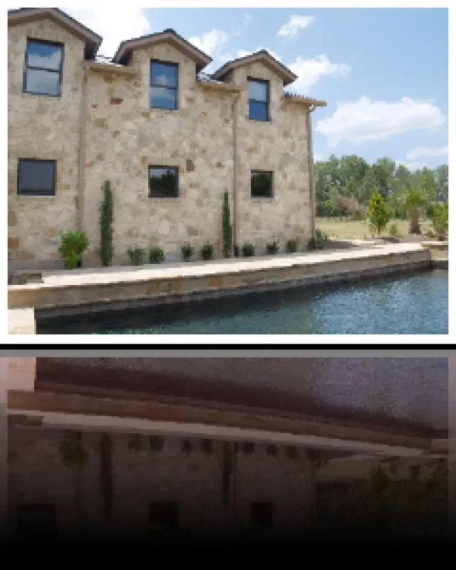 A picture of a house next to a body of water