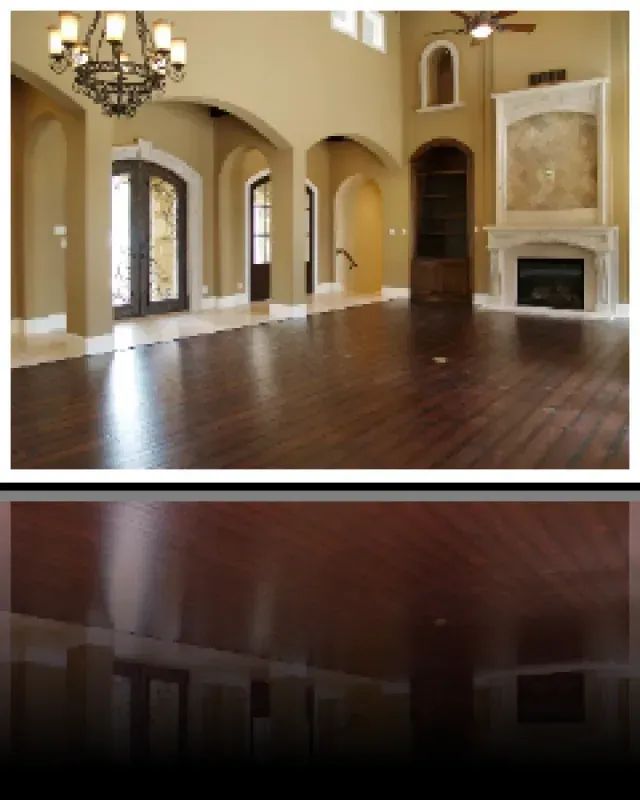 A living room with a fireplace and a chandelier