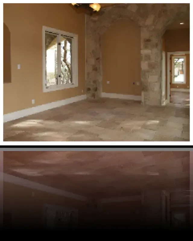 A picture of an empty room with a reflection of the floor