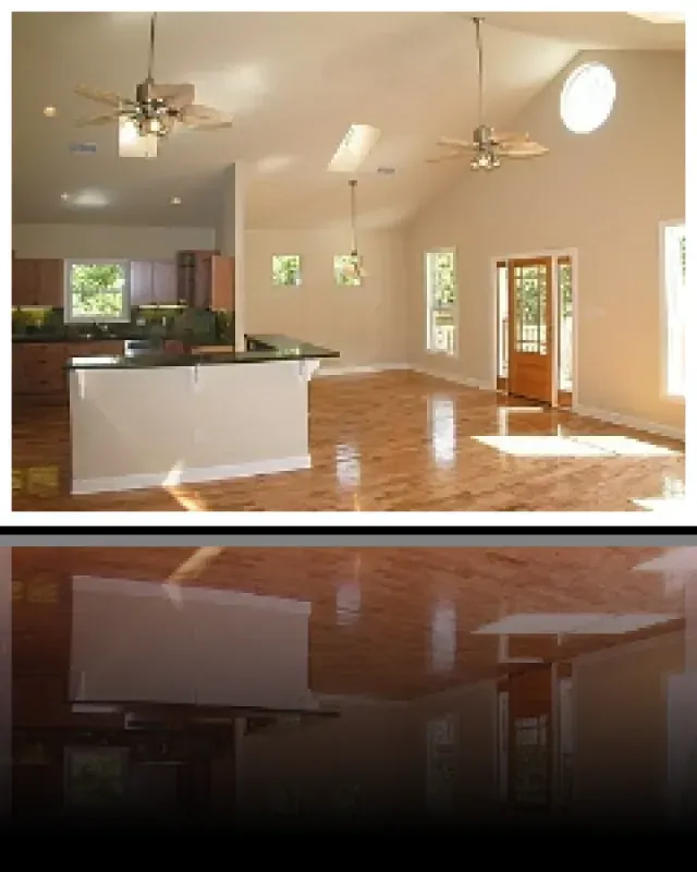 A picture of an empty house with a ceiling fan