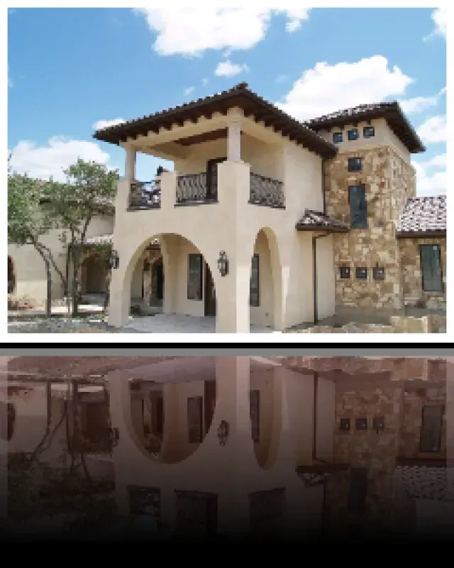 A picture of a house with a balcony and a reflection of the house