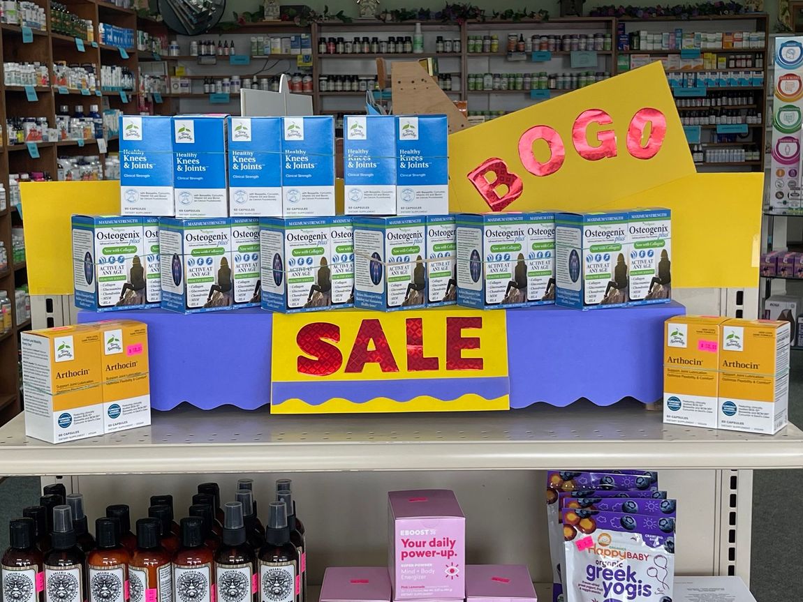 A display in a pharmacy with a sign that says sale — Grand Island, NE — Natural Food Products