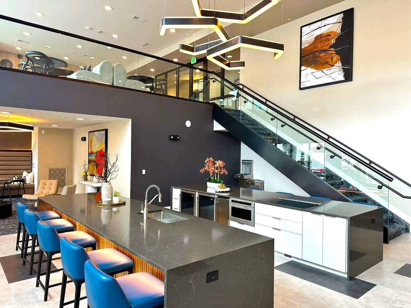 A group of people are walking down a street in front of The Experience at Epicenter