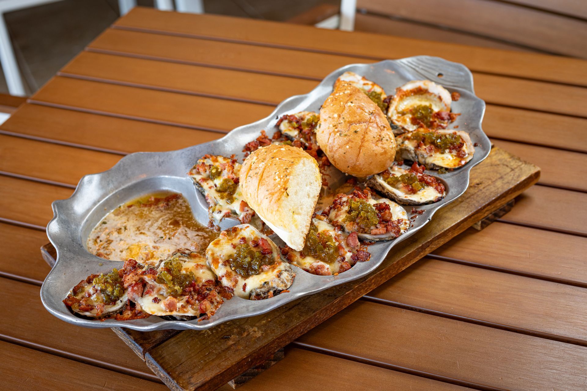 gulf oysters, fresh oysters, raw oysters, cooked oysters, baked oysters, seafood, waterfront dining, restaurant on the beach