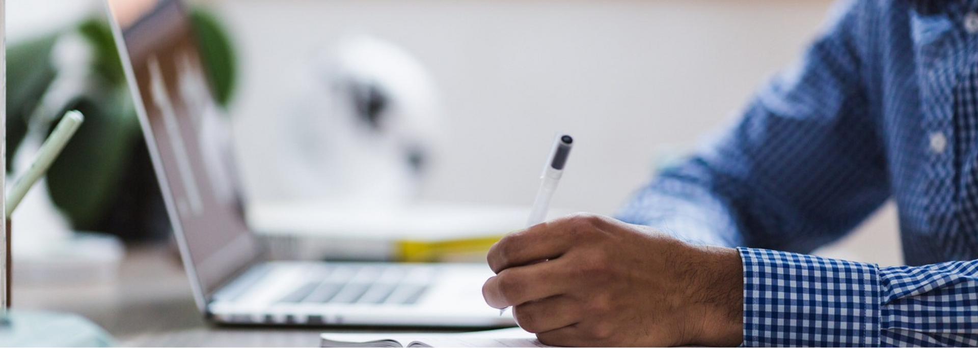 Picture of someone researching at a computer.