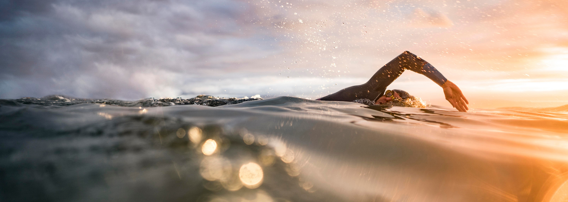 Picture of a person swimming in the sea. Picture of a person swimming in the sea.
