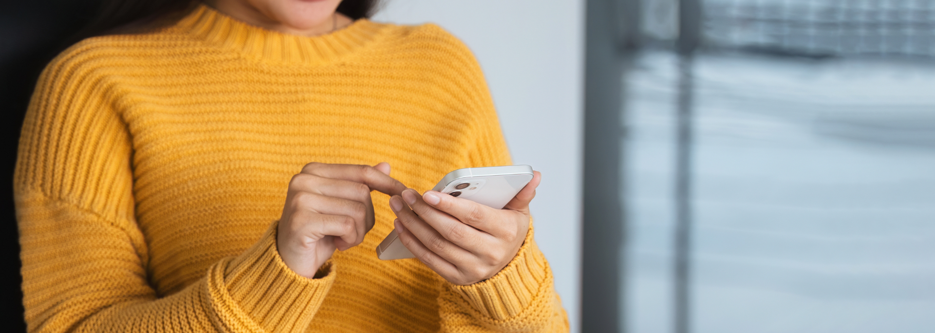 Picture of someone using a smart phone. Picture of someone using a smart phone.