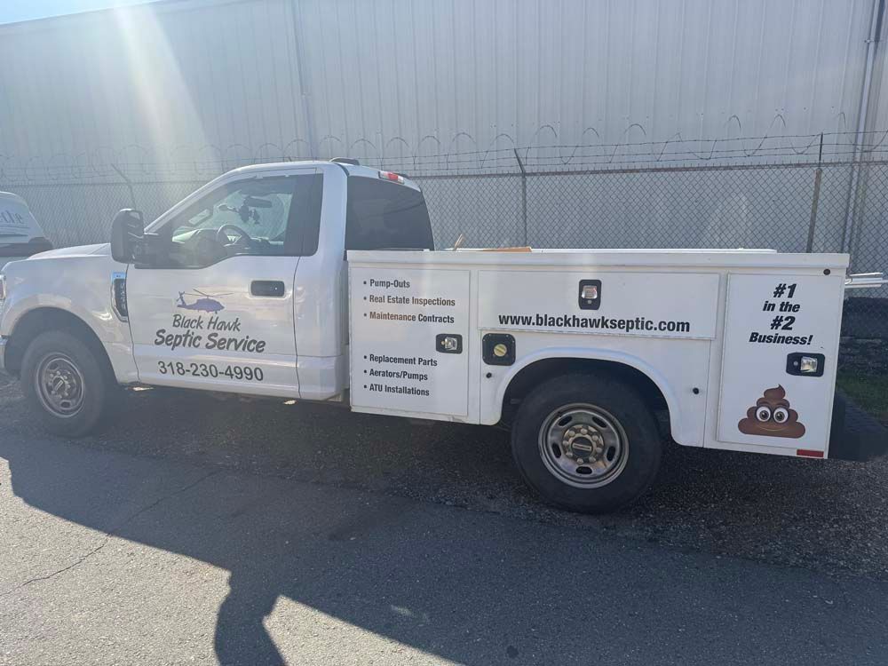 White truck with utility box. 