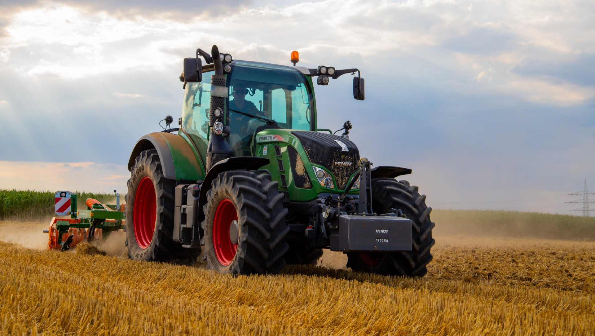 tractor cutting hay in southwest florida