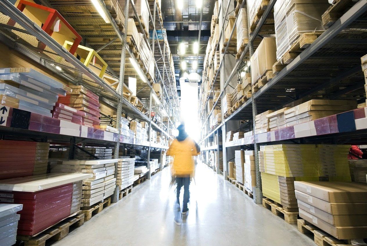 Man Checking Warehouse — Naperville, IL — JBS Logistics Inc.