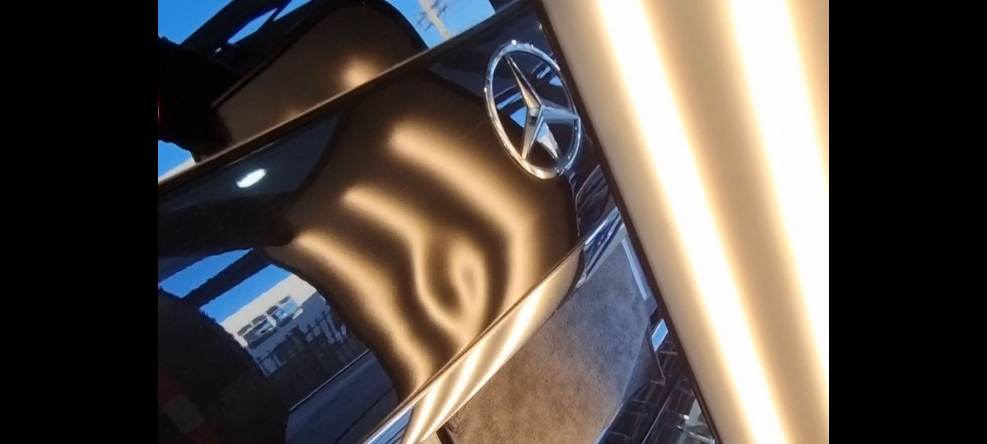 a mercedes car with dents