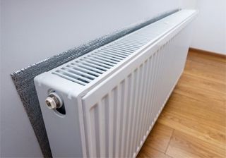 Air Conditioning — White Metal Heating Radiator in Andover, NJ