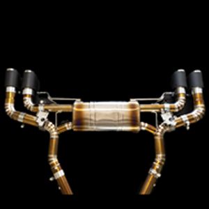 A close up of a exhaust pipe on a black background.