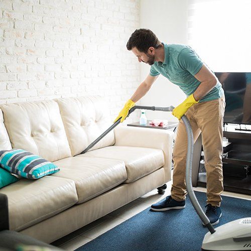 Man Cleaning the Sofa — Wooster, OH — MTO Clean of Wayne County