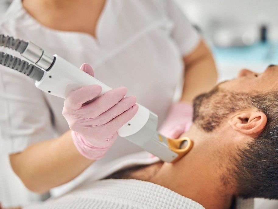 Laser Hair Removal Coventry providing laser hair removal for a man's neck in Coventry Clinic