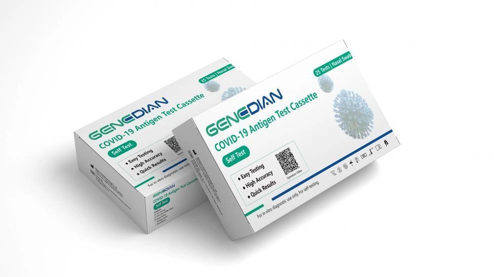A box of covid-19 rapid antigen test with a test kit.