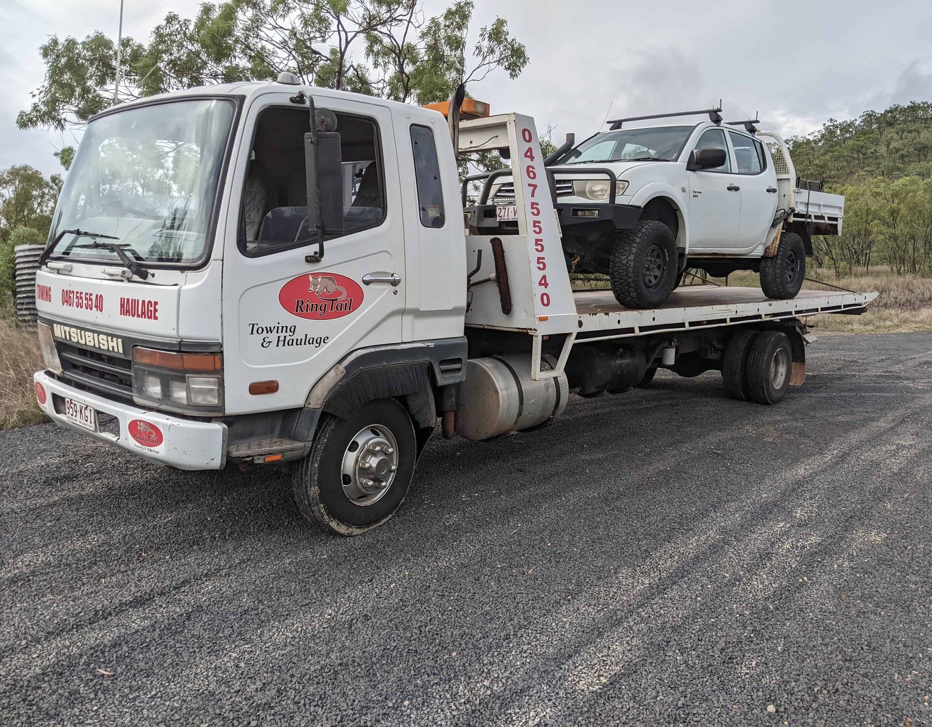 A ute being towed by a towing truck— Ringtail Towing in Atherton Tablelands, QLD
