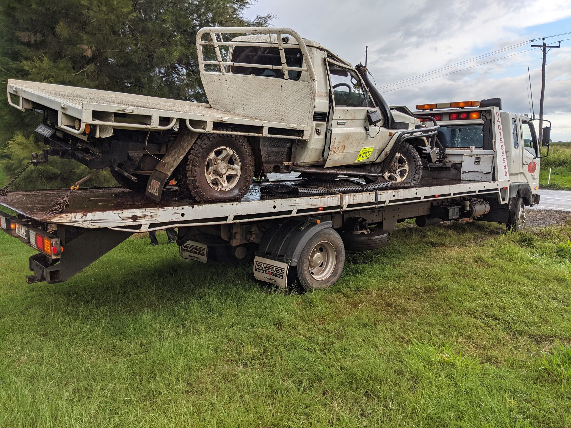 A Car is Stuck in a Muddy River — Ringtail Towing in Atherton Tablelands, QLD