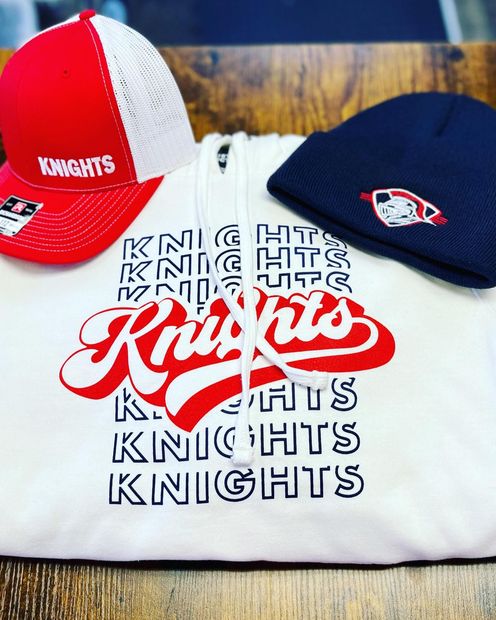 A white hoodie with the word knights on it