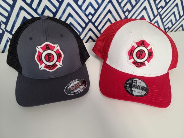 Two shirts and a mug with the h & b electric logo on them