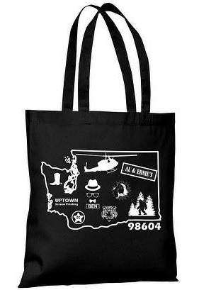 Black tote bag with a white outline of Washington state and various related icons.