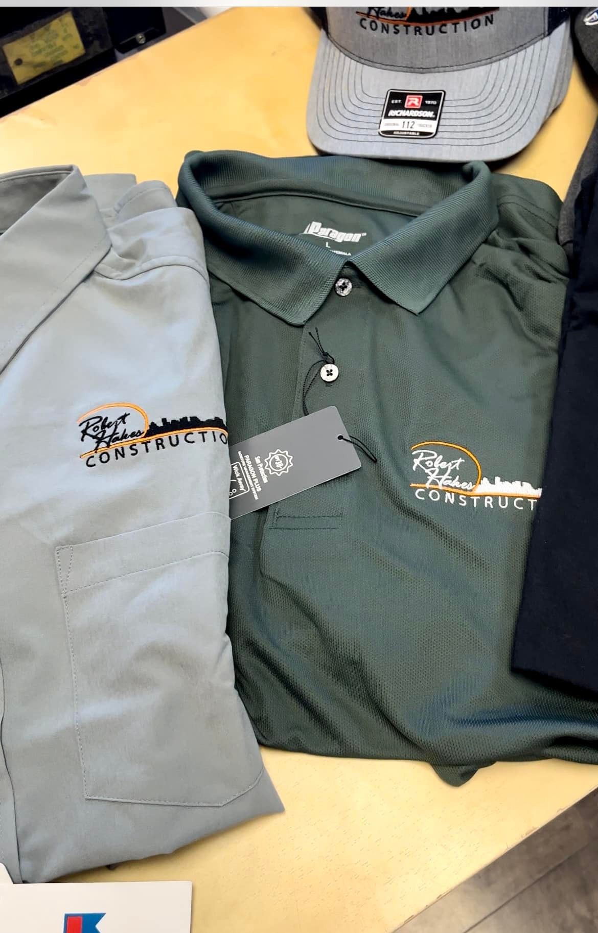 A blue bag that says uptown screen printing on it