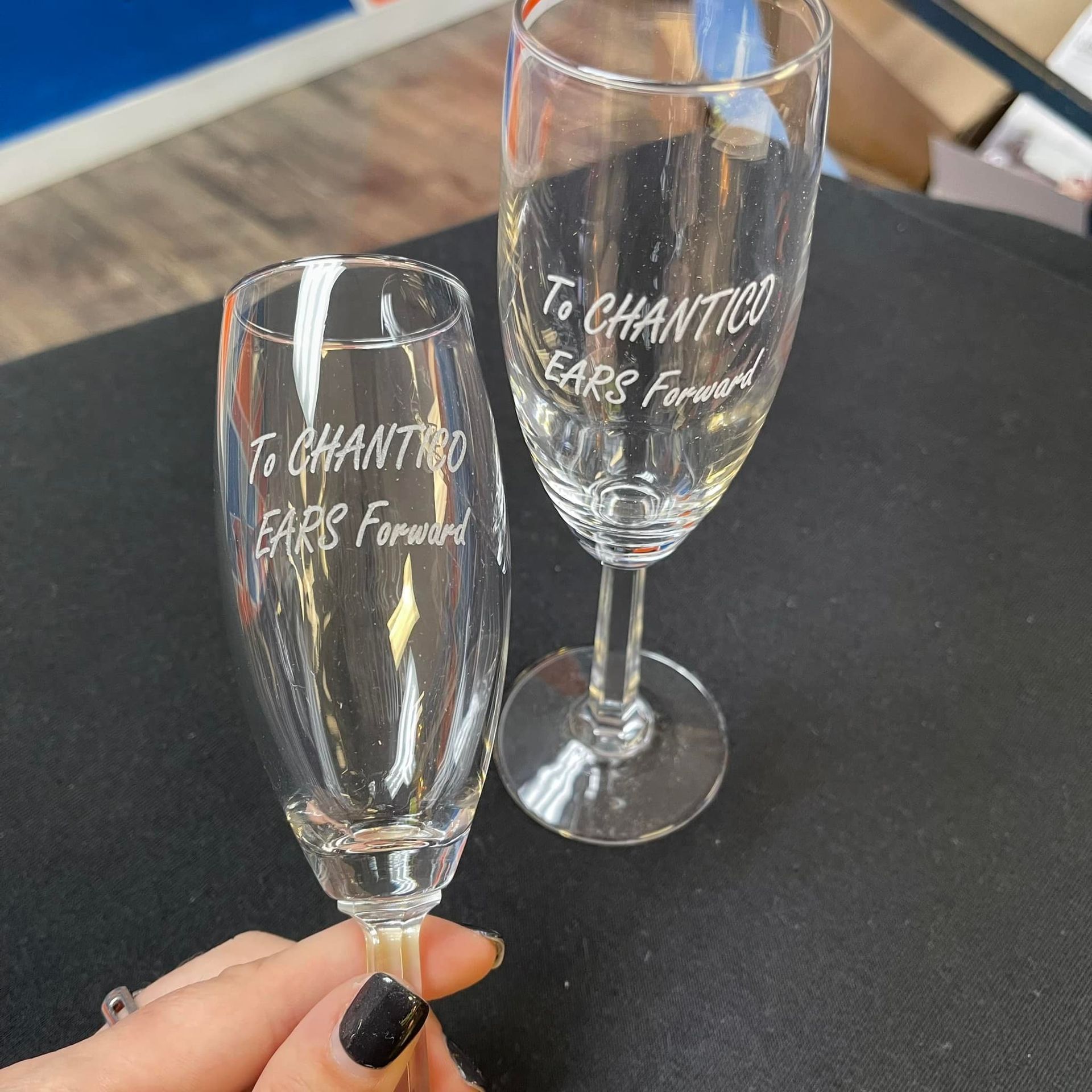 A blue bag that says uptown screen printing on it