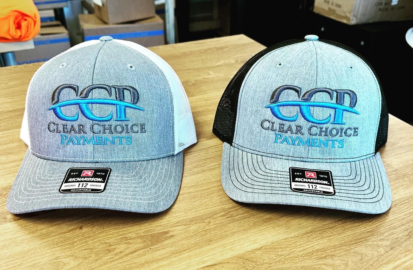 A blue bag that says uptown screen printing on it