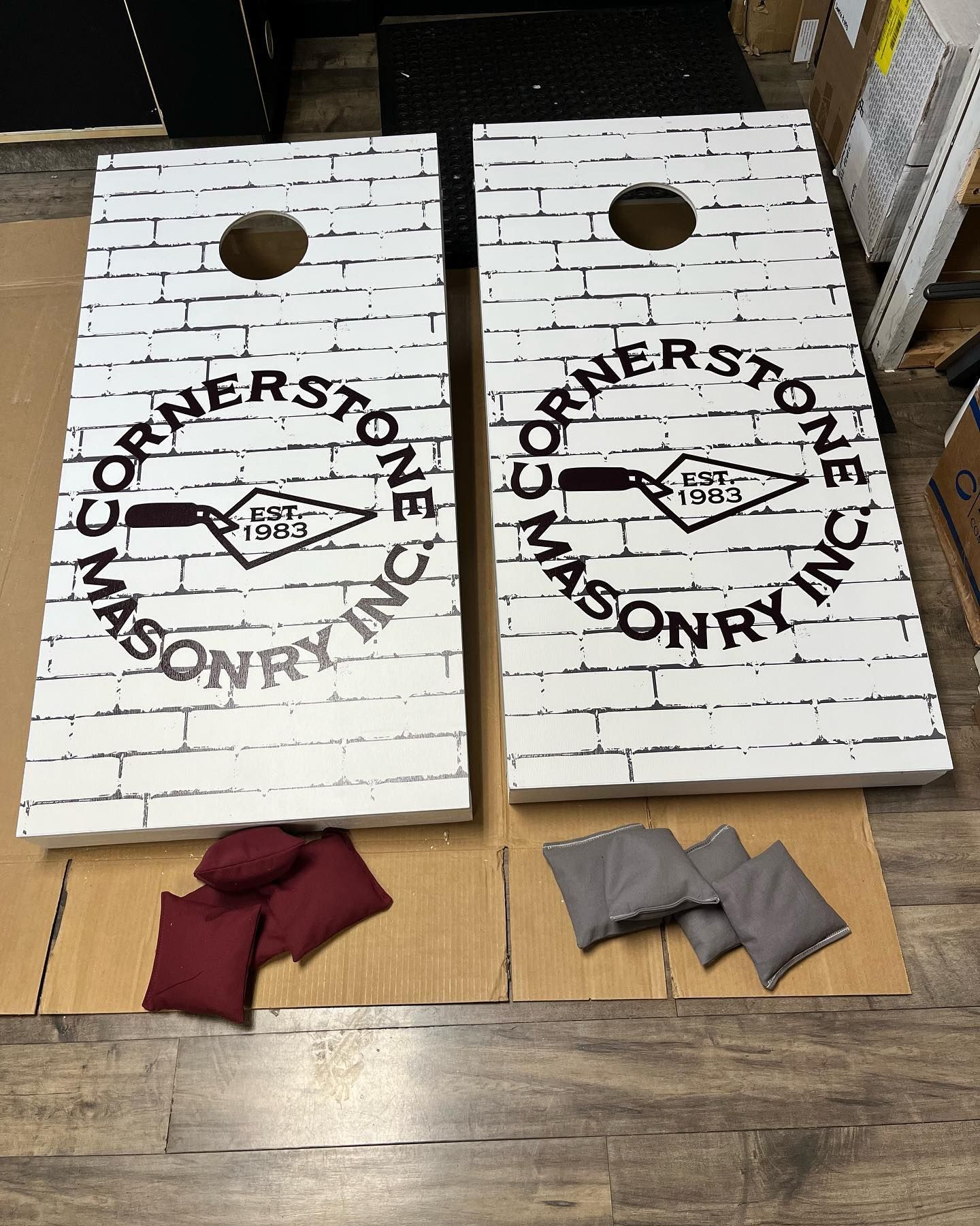 Two shirts and a mug with the h & b electric logo on them